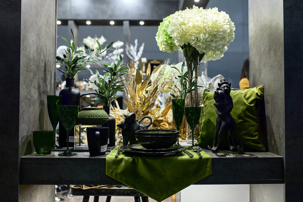 a showcase with the laying of porcelain dishes. Beautiful merchandising, dishes for restaurants and hotels - Photo, Image