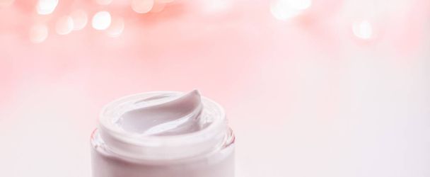 Crema facial hidratante tarro sobre fondo de brillo de vacaciones, mois
 - Foto, Imagen