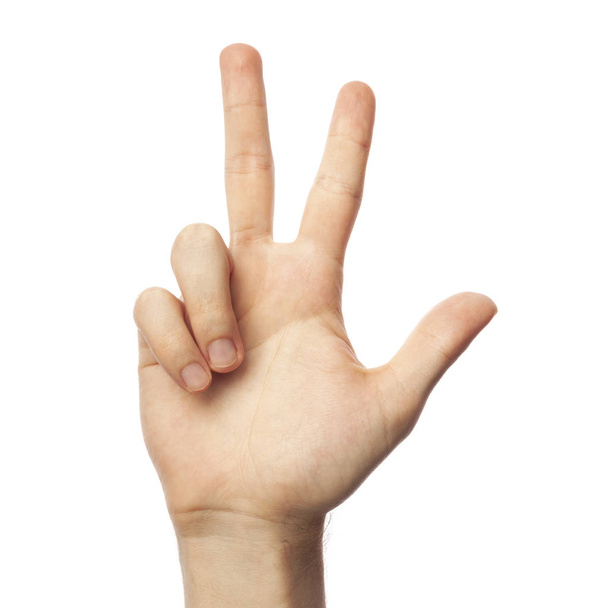  Ortografia delle dita numero 3 in ASL su sfondo bianco. Concetto di linguaggio dei segni americano
 - Foto, immagini