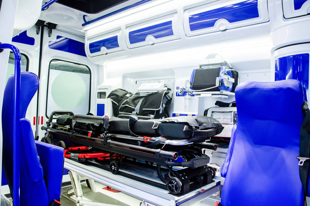 Inside an ambulance car with medical equipment. - Photo, Image