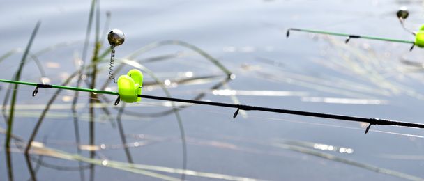 Feeder method in fishing and bells on the rods tips - Photo, Image