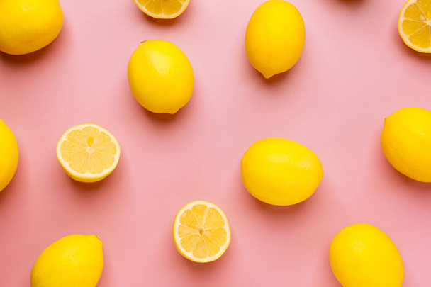 Ripe lemons on color background - Φωτογραφία, εικόνα
