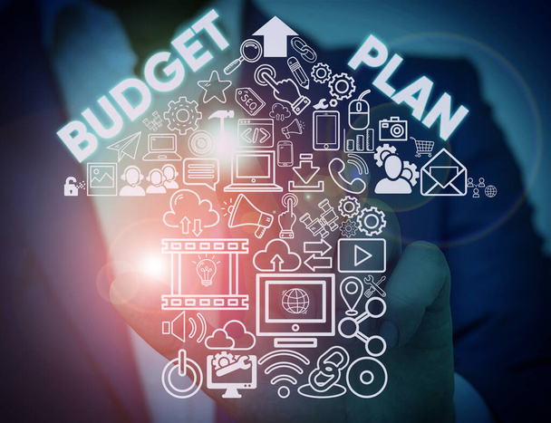 Writing note showing Budget Plan. Business photo showcasing financial schedule for a defined period of time usually year Male wear formal work suit presenting presentation smart device. - Photo, Image