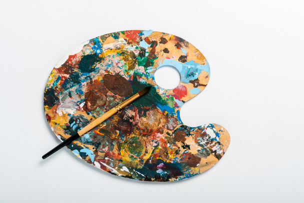 top view of palette with colorful gouache paint isolated on white  - Fotografie, Obrázek