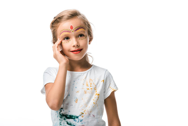 heureux enfant avec visage peinture sourire isolé sur blanc
  - Photo, image