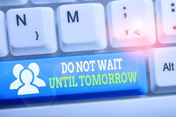 Conceptual hand writing showing Do Not Wait Until Tomorrow. Business photo text needed to do it right away Urgent Better do now Keyboard with note paper on white background key copy space. - Photo, Image