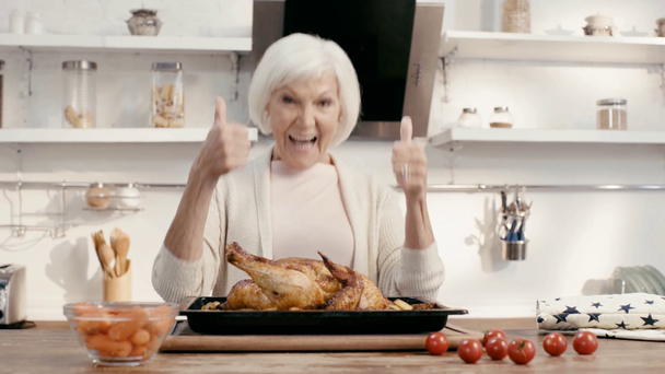 woman smelling turkey and showing thumbs up  - Footage, Video