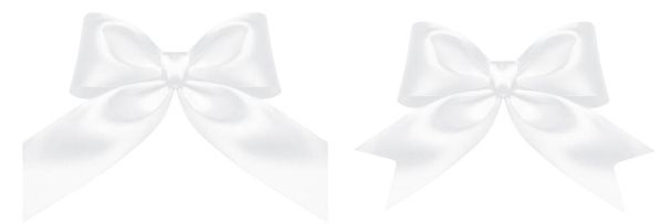 Fehér ajándék íj selyem szalag elszigetelt fehér háttérrel. Karácsonyi dekoráció ünnepi ajándék doboz - Fotó, kép