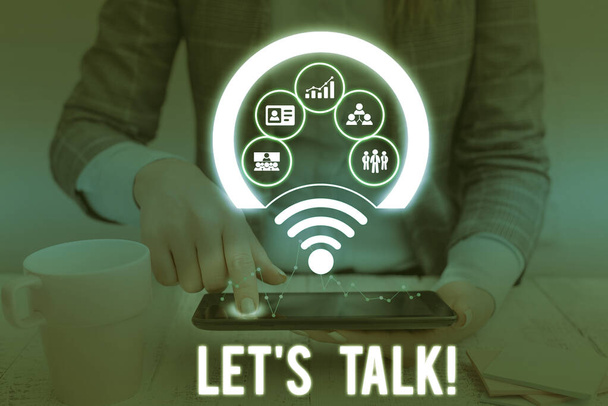Conceptual hand writing showing Let S Talk. Business photo showcasing they are suggesting beginning conversation on specific topic Picture photo network scheme with modern smart device. - Photo, Image