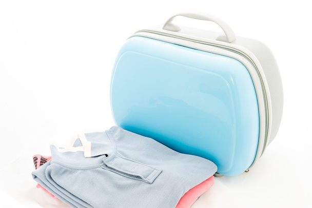 Clothing , blue suitcase for travalling - Photo, Image