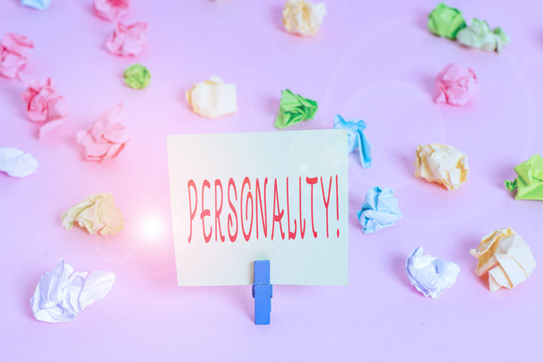 Writing note showing Personality. Business photo showcasing combination characteristics that form individuals character Colored crumpled papers empty reminder pink floor background clothespin. - Photo, Image