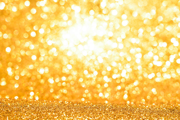 sparkles of golden glitter abstract background - Photo, Image
