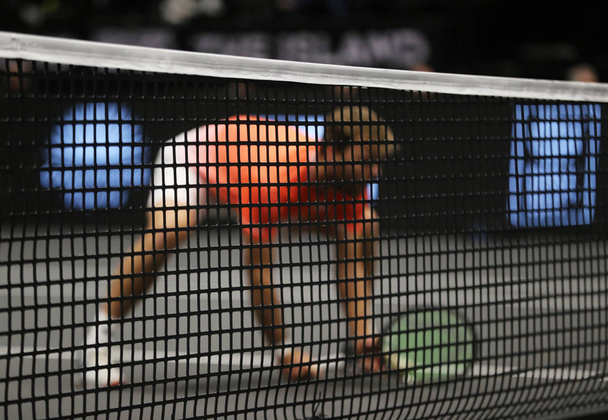 Tennisspeler aan het Hof tijdens verdubbelt wedstrijd - Foto, afbeelding