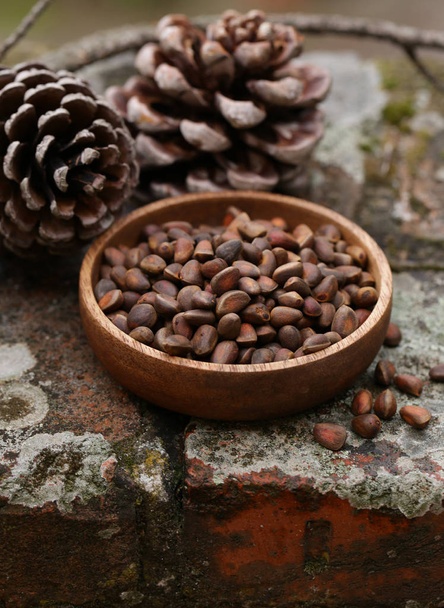 natural organic pine cones and nuts - Фото, изображение