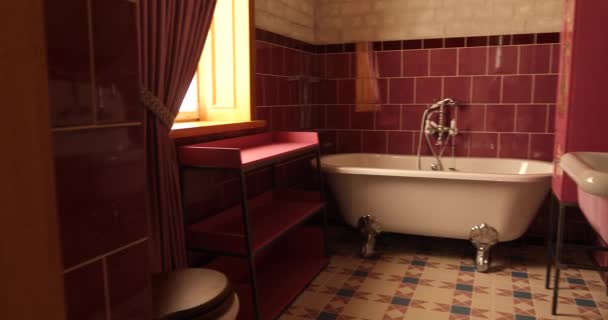 Elegant bathroom with modern design in pink color - Footage, Video