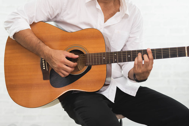 man playing acoustic guitar on white background - Photo, Image