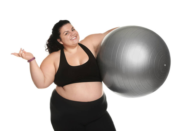 Overweight woman with fit ball on white background - Foto, Imagen