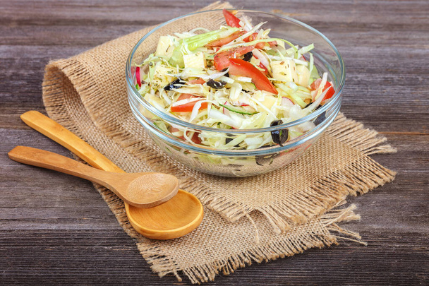 Fresh vegetables and vegetable salad in dishes - Zdjęcie, obraz