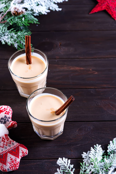 Eggnog Gemadinha is an alcoholic beverage or cocktail on dark wooden background, Christmas dinner drink. - Foto, immagini