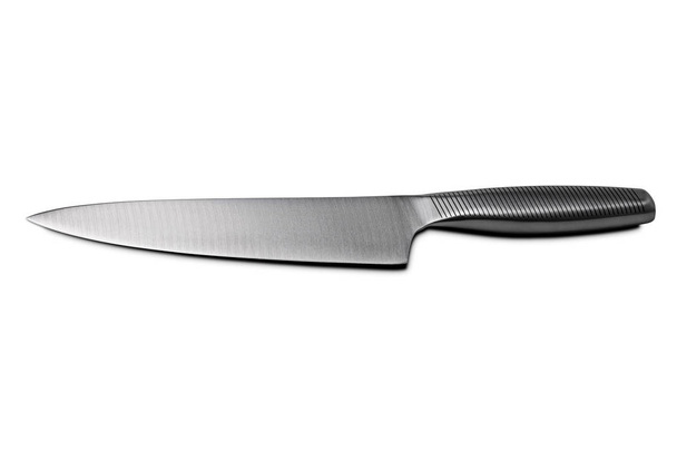 Ένα μεταλλικό μαχαίρι κομμένο σε λευκό φόντο. - Φωτογραφία, εικόνα