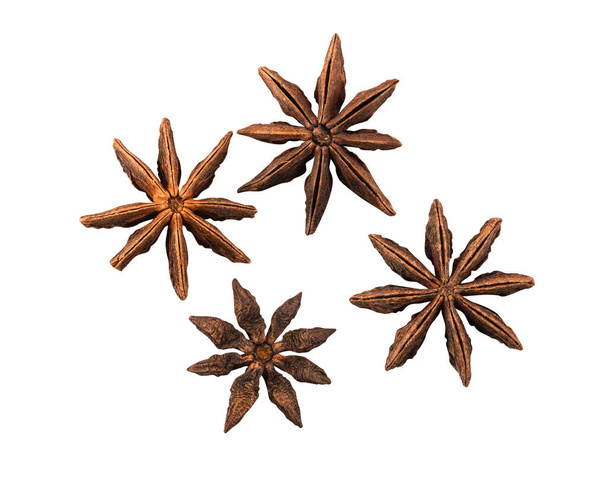 Anise stars isolated on white background with copy space for text or images. Spices and herbs. Close-up shot, top view. - Valokuva, kuva