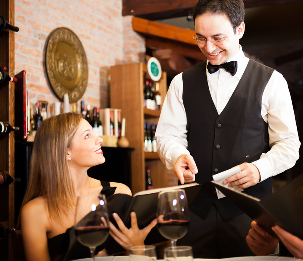 Waiter suggesting food - Photo, Image