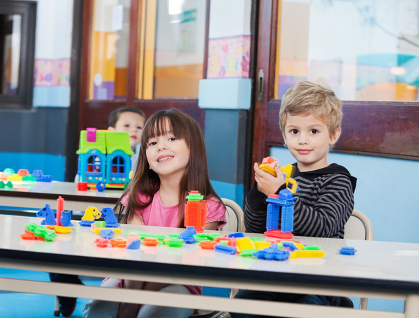 Little Children Playing With Blocks In Preschool - Zdjęcie, obraz