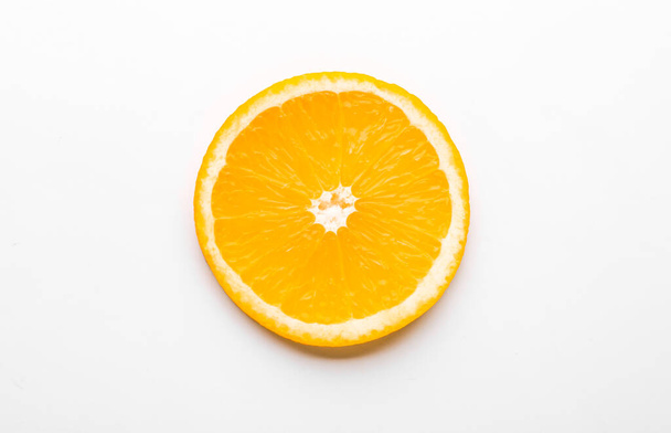 Fresh orange slice on white background - Foto, Bild