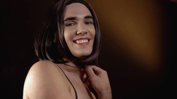 Beautiful transgender in female outfit smiling at camera, lgbt society lifestyle - Фото, зображення