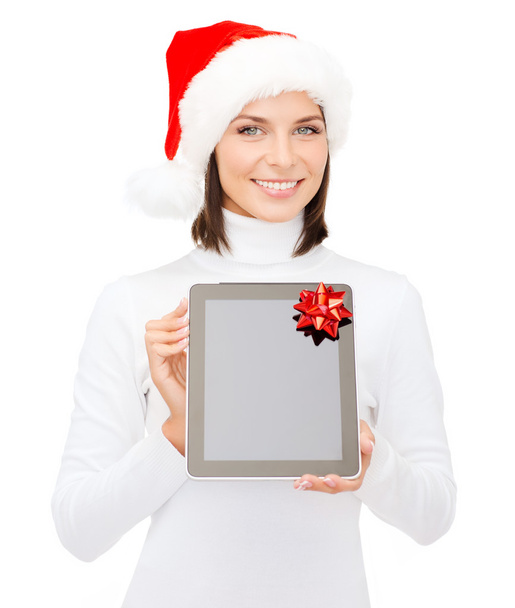 Woman in santa helper hat with tablet pc - Foto, Imagen