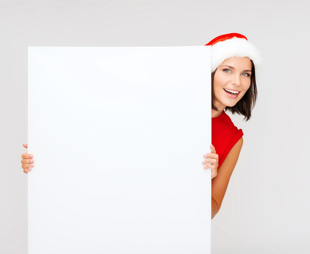 Woman in santa helper hat with blank white board - Φωτογραφία, εικόνα