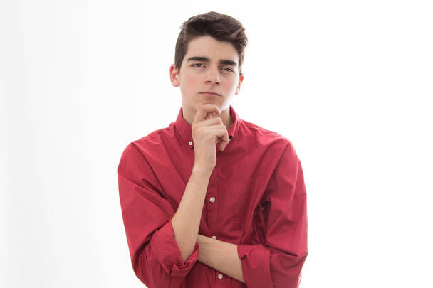 thoughtful young teenage man isolated on white background - Фото, изображение