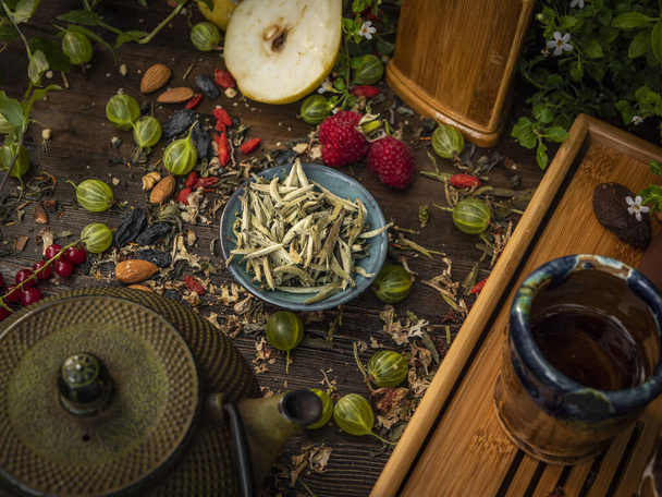 Preparation of the tea ceremony, tea in the bowl. Handmade cups - Фото, изображение