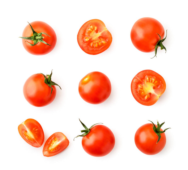 Conjunto de tomates cereja, metades e partes em um branco. A vista do topo
. - Foto, Imagem