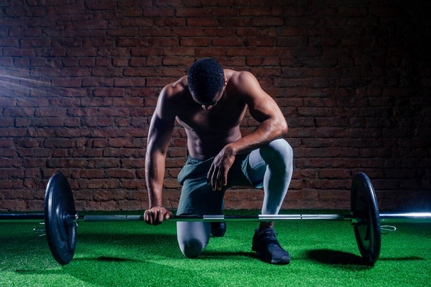 african american man with dumbbell weight training equipment gym - Φωτογραφία, εικόνα