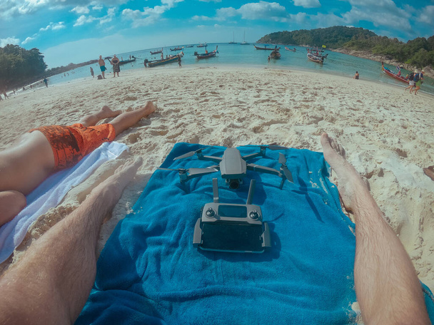 Drone and remote controller on the beach in Thailand - Фото, зображення