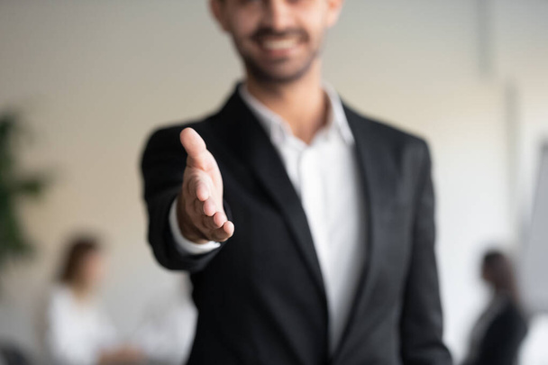 Professional businessman hr salesman wear suit extending hand at camera - Photo, Image