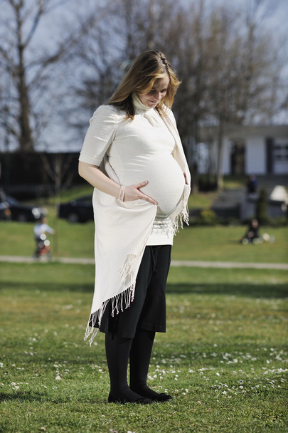 Happy young pregnant woman outdoor - Foto, Imagen