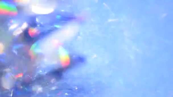 Αφηρημένη όμορφη θολή φόντο με κινούμενα σωματίδια glitter, αστράφτει και τα Χριστούγεννα tinsel για εορταστικό σχεδιασμό. - Πλάνα, βίντεο