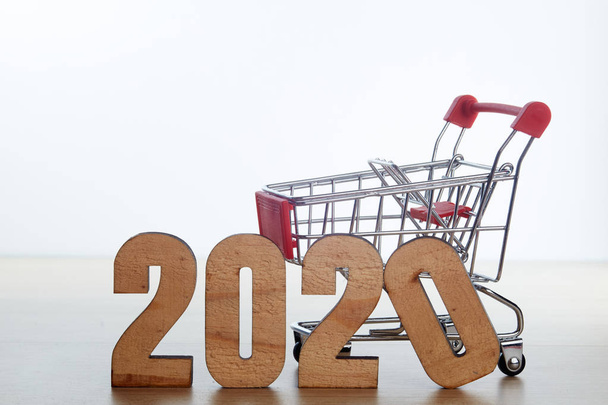 New year 2020 festival shopping concept on wooden - Foto, imagen