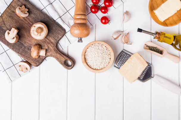Mushroom risotto ingredients on the white table - 写真・画像