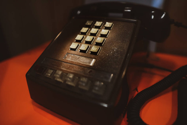 Details with an old school, retro/vintage style telephone. - Fotó, kép
