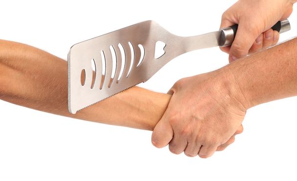 Hand cut off spatula. - Fotoğraf, Görsel