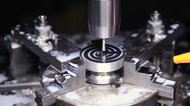 CNC milling machine in operation high-tech machine lathe metal processing. Metalworking CNC lathe milling machine. Cutting metal modern processing technology. - 映像、動画