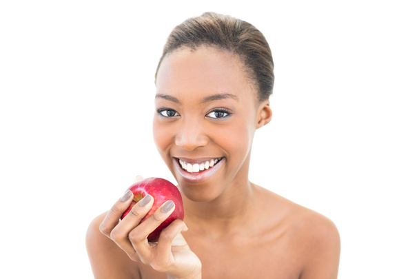 Smiling natural beauty holding red apple - Fotoğraf, Görsel