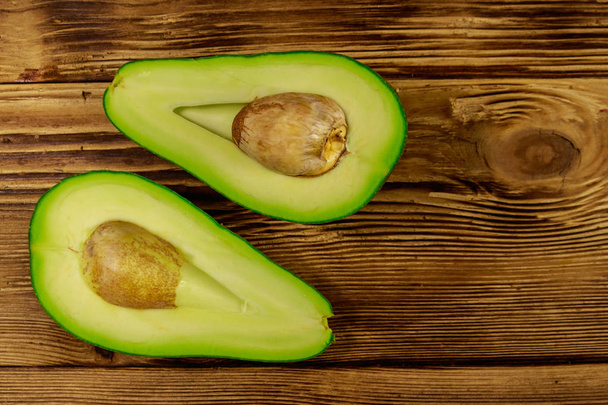 Fresh avocado on wooden table - Photo, Image