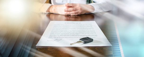Female car buyer sitting in front of contract; multiple exposure - Photo, image