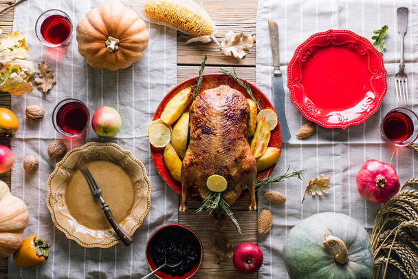 Thanksgiving dinner table with turkey, top view - Photo, Image