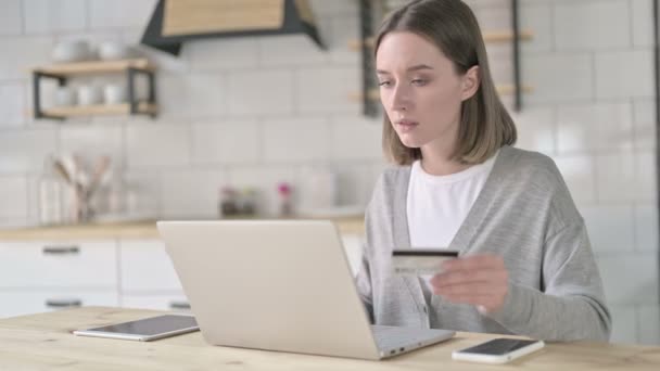 Unsuccessful Young Woman using Credit Card on Laptop - Felvétel, videó