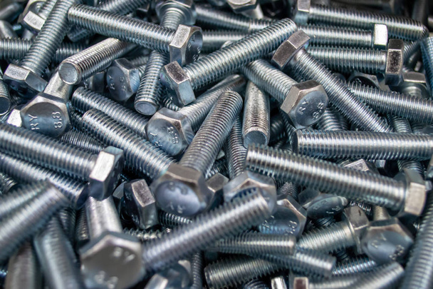 Large number of metal, steel bolts. Close-up. Macro. Background  - Photo, Image